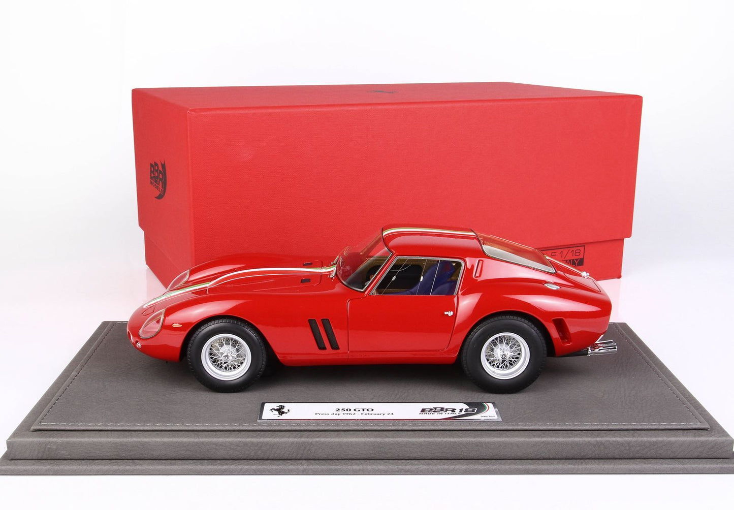 Red Ferrari 250 GTO model car on display base with red box, available through Vroomi