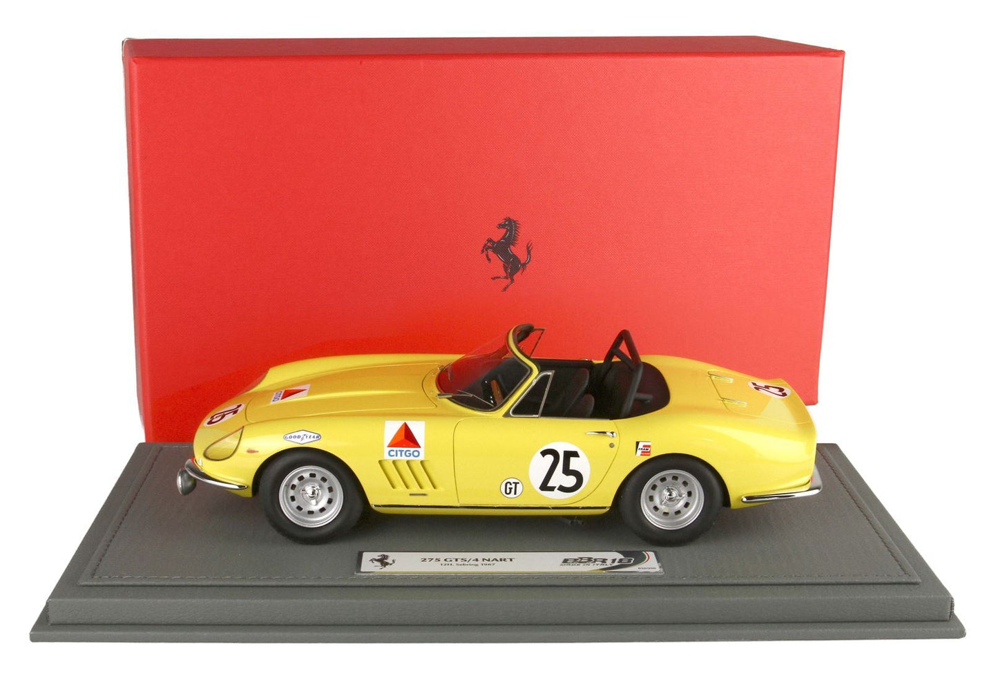 Yellow 1:18 scale Ferrari 275 GTS/4 NART model car with racing decals, displayed with red Ferrari box, available on Vroomi