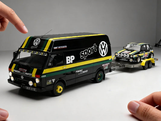 Black VW sport van with yellow and green stripes towing a matching rally car model on trailer, featured on Vroomi