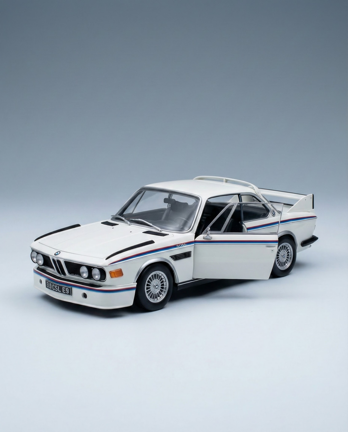 scale model car BMW 3.0 CSL E9 with doors open, available for collectors online