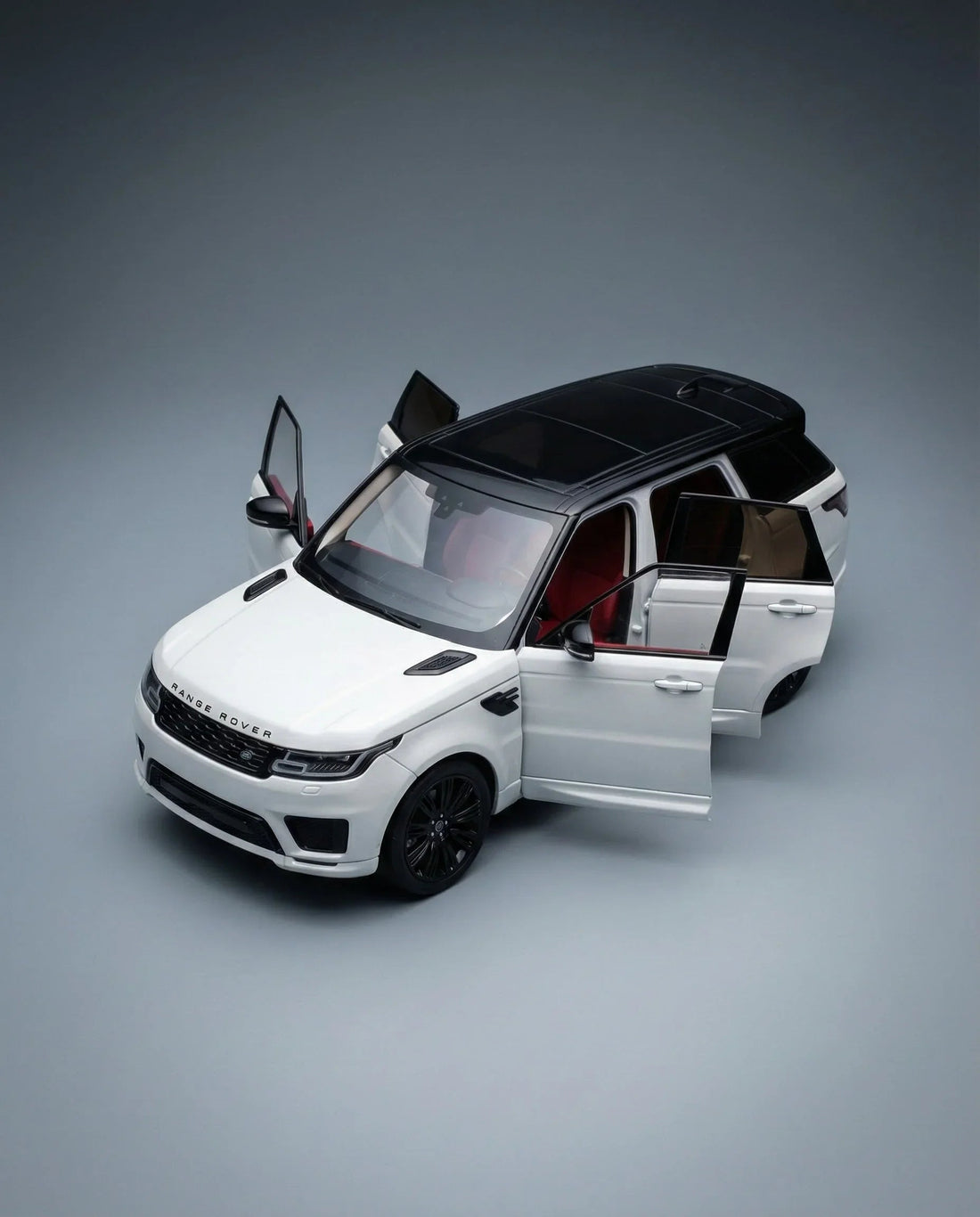 Range Rover im Maßstabsmodell Range Rover geöffneten Türen, Sammler-Replik online bestellbar
