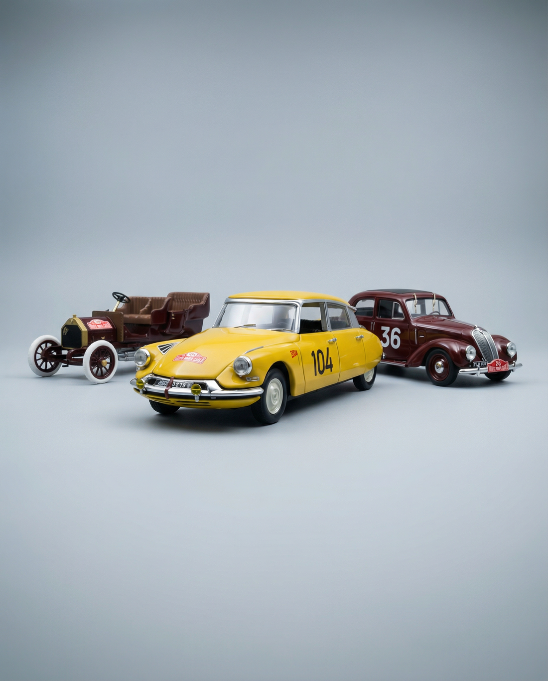 Three scale model cars of Rally di Montecarlo