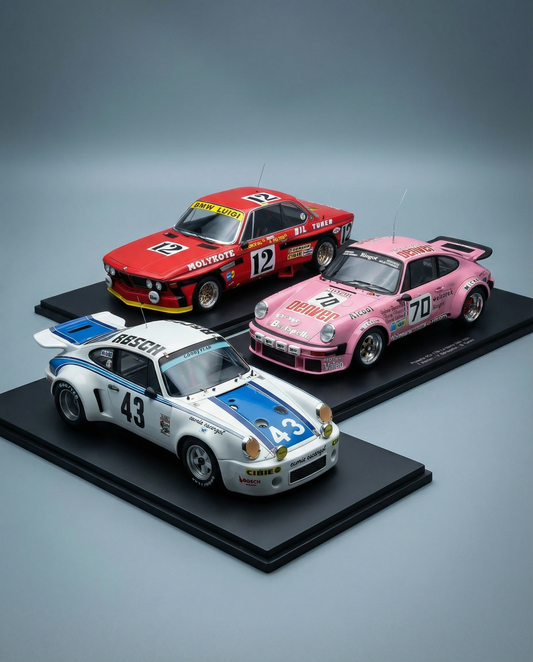 Three scale models of racing cars by Spark Model
