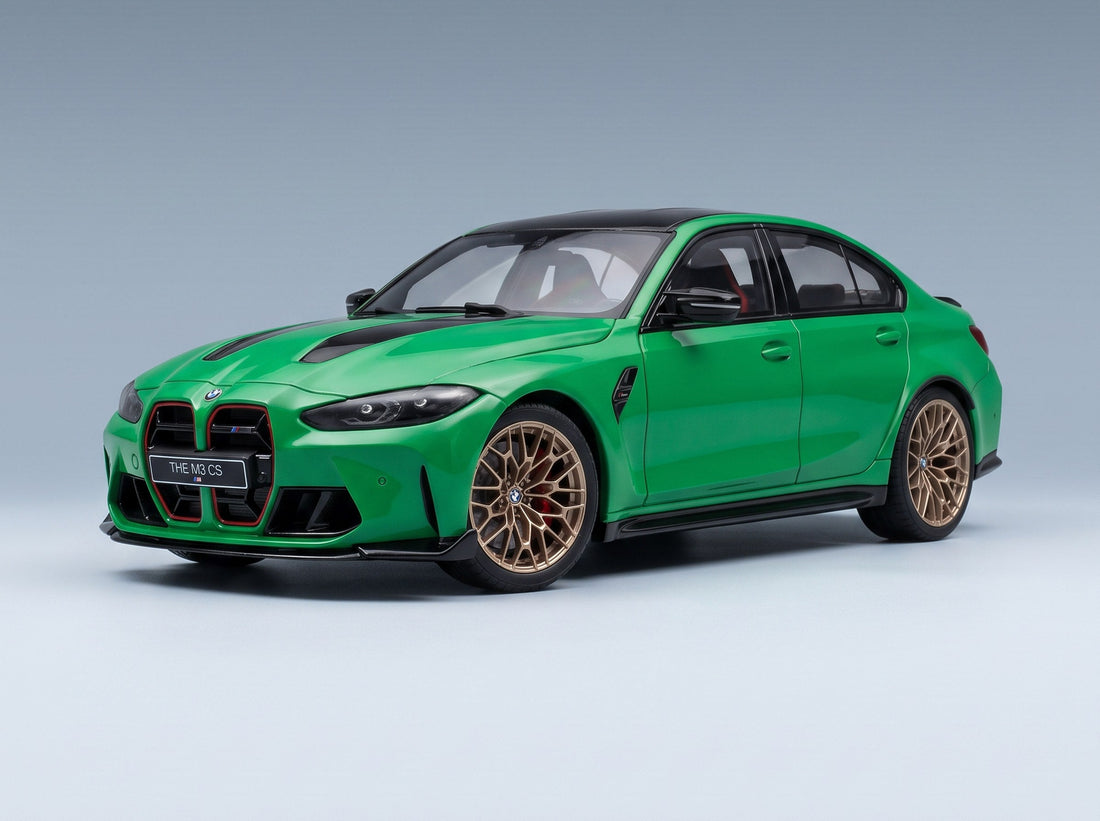 BMW M3 CS G80 scale model in Signal Green with gold wheels, 1:18
