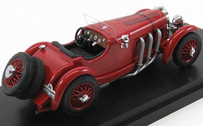 Red vintage racing car model with spare tires and chrome exhaust displayed on a black stand, available on Vroomi