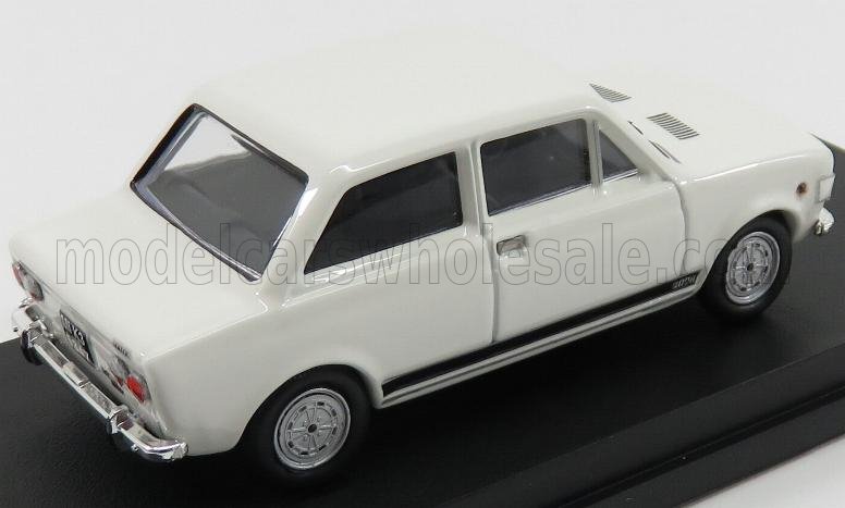White classic four-door vintage car model on black display base, now accessible via Vroomi