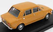 Vintage yellow four-door sedan model car displayed on black platform, available on Vroomi