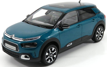 Blue Citroën C4 Cactus compact SUV model car shown in studio with Vroomi availability