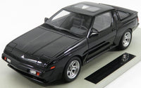 Modellino in scala Mitsubishi Starion ESI-R nero su base espositiva, edizione limitata da collezione di Vroomi