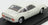 Voiture miniature blanche sur socle noir avec plaque d'immatriculation FXC 206C, pour collectionneurs chez Vroomi
