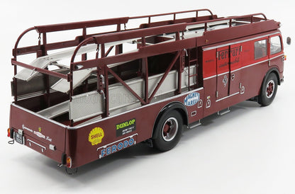 Vintage red Ferrari race car transporter model with sponsor decals available on Vroomi