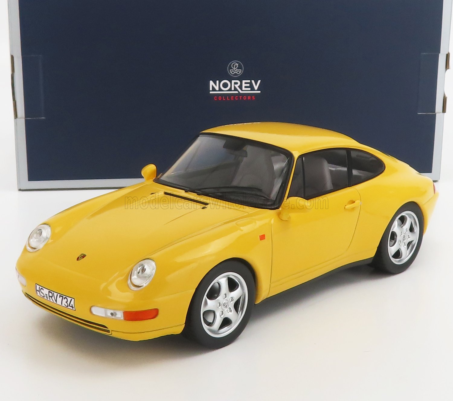 Yellow Porsche 911 scale model car by Norev, showcased with Vroomi for collectors