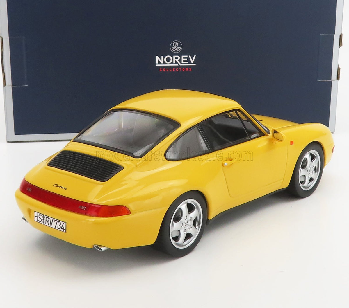 Yellow Porsche 911 Carrera scale model car by Norev, showcased for Vroomi collectors