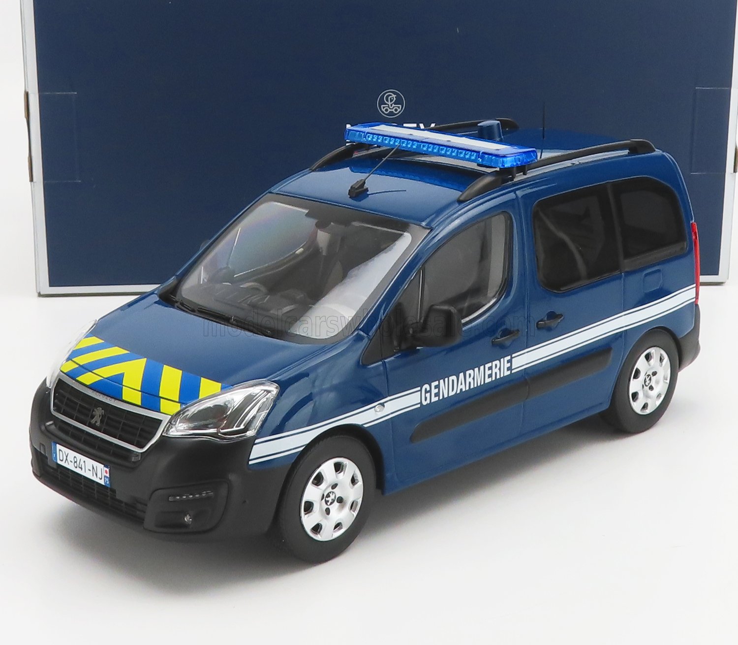 Blue Peugeot Gendarmerie police van model with roof light bar, yellow-striped hood, available on Vroomi