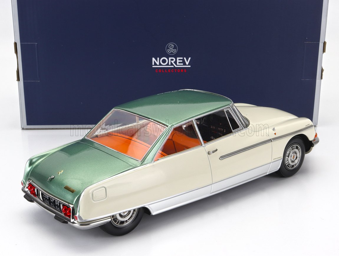 Green and cream Citroën DS scale model car by Norev, showcased with Vroomi collector packaging.