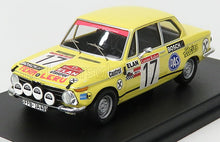Yellow vintage race car scale model with rally decals, collectible and available now online.