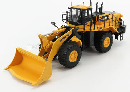 Detailed yellow Komatsu wheel loader scale model with realistic tires and cab, available at Vroomi