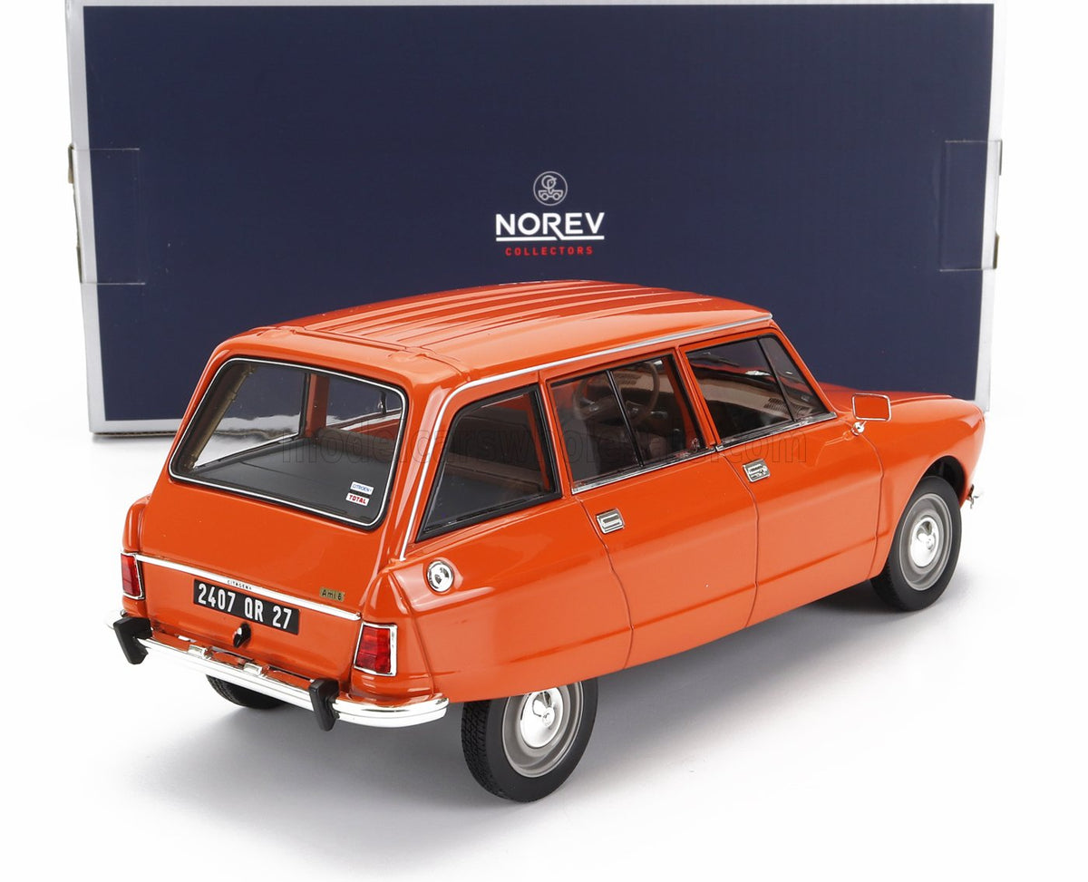 Orange Citroën Ami 8 scale model car by Norev, displayed with collector box — Vroomi