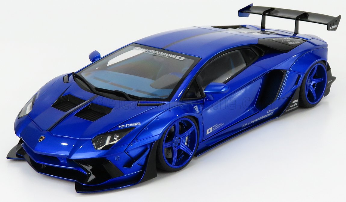 Blue customized Lamborghini sports car model with large rear wing, L.B. Performance kit, available on Vroomi