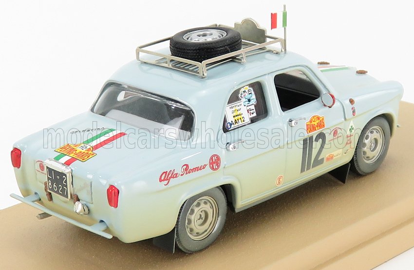 Light blue Alfa Romeo vintage rally model car with racing decals, spare tire on roof rack, available on Vroomi