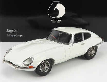 Model of a Jaguar E-Type Coupe on a white background with a black banner displaying 'Jaguar' and 'E-Type Coupe'.