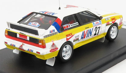 White and yellow Audi race car model with AVIN and Nike logos, number 27, shown on display platform, available through Vroomi