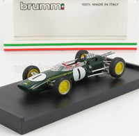 Coche a escala Team Lotus verde con llantas amarillas, sobre peana negra — Vroomi