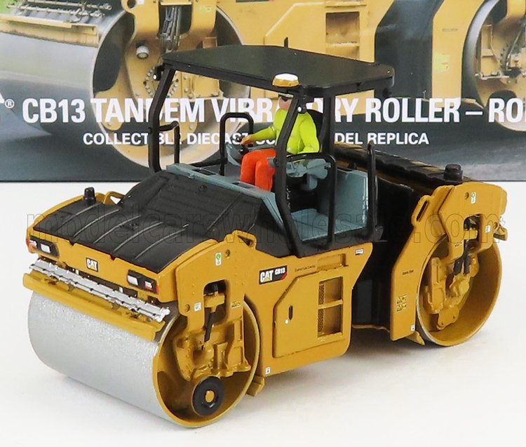 Yellow CAT CB13 tandem vibratory roller model with operator figure, available on Vroomi platform