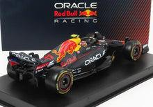 RED BULL | F1  RB18 TEAM ORACLE RED BULL RACING N 11 SEASON 2022 SERGIO PEREZ - WITH HELMET AND PLASTIC SHOWCASE | MATT BLUE YELLOW