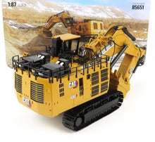 1:87 scale CAT 6060 excavator model with detailed arm and black tracks, available on Vroomi