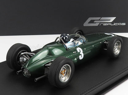 Green vintage Formula 1 race car model with number 3, displayed on black base, available on Vroomi