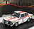 Voiture miniature Team Toyota blanche à bandes rouges, numéro 5, présentée à Vroomi