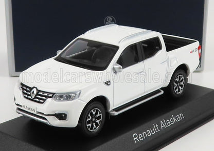 White Renault Alaskan pickup truck model with 4WD badge, displayed on stand, also available on Vroomi