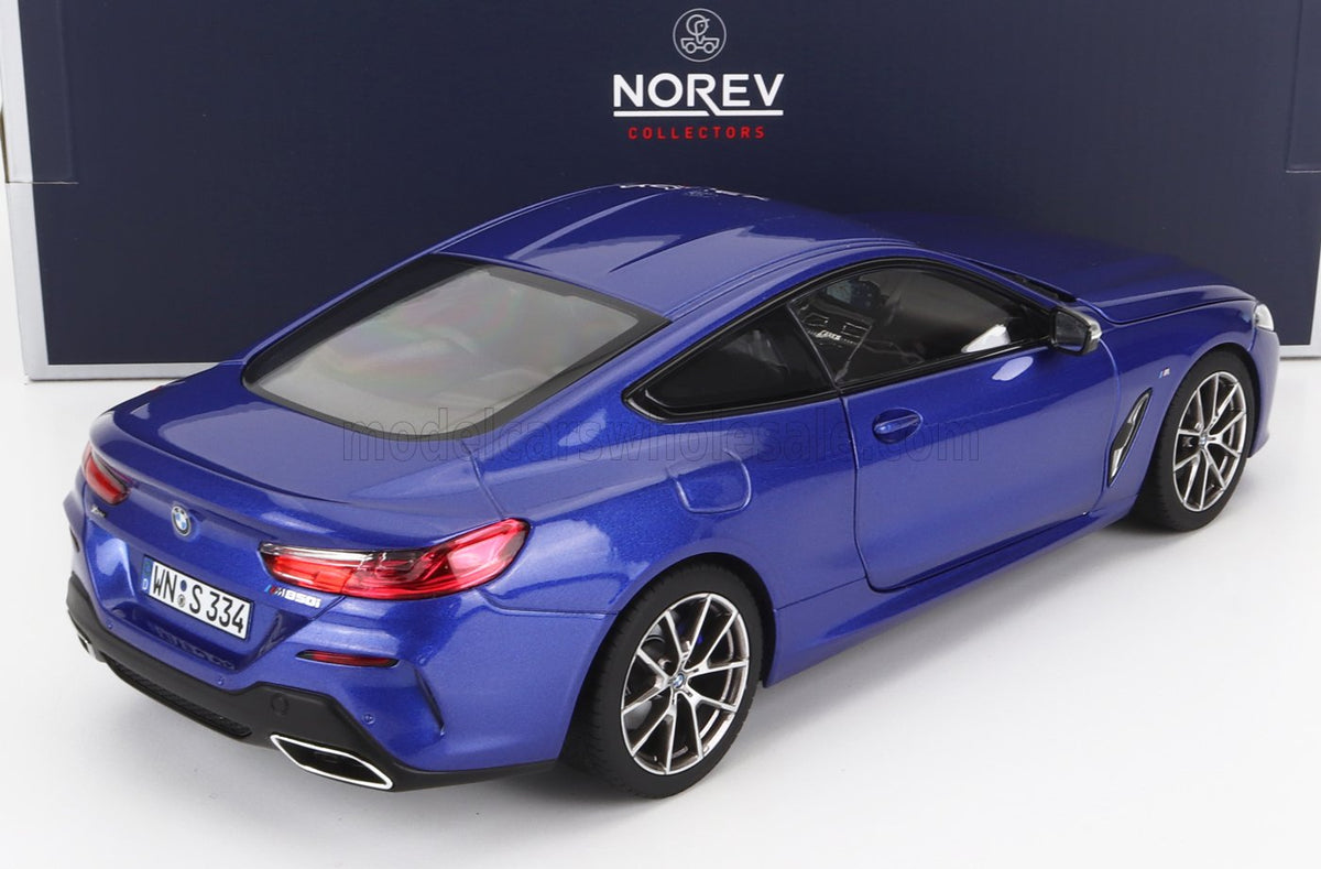 Blue BMW M850i scale model car by Norev, showcased for Vroomi collectors