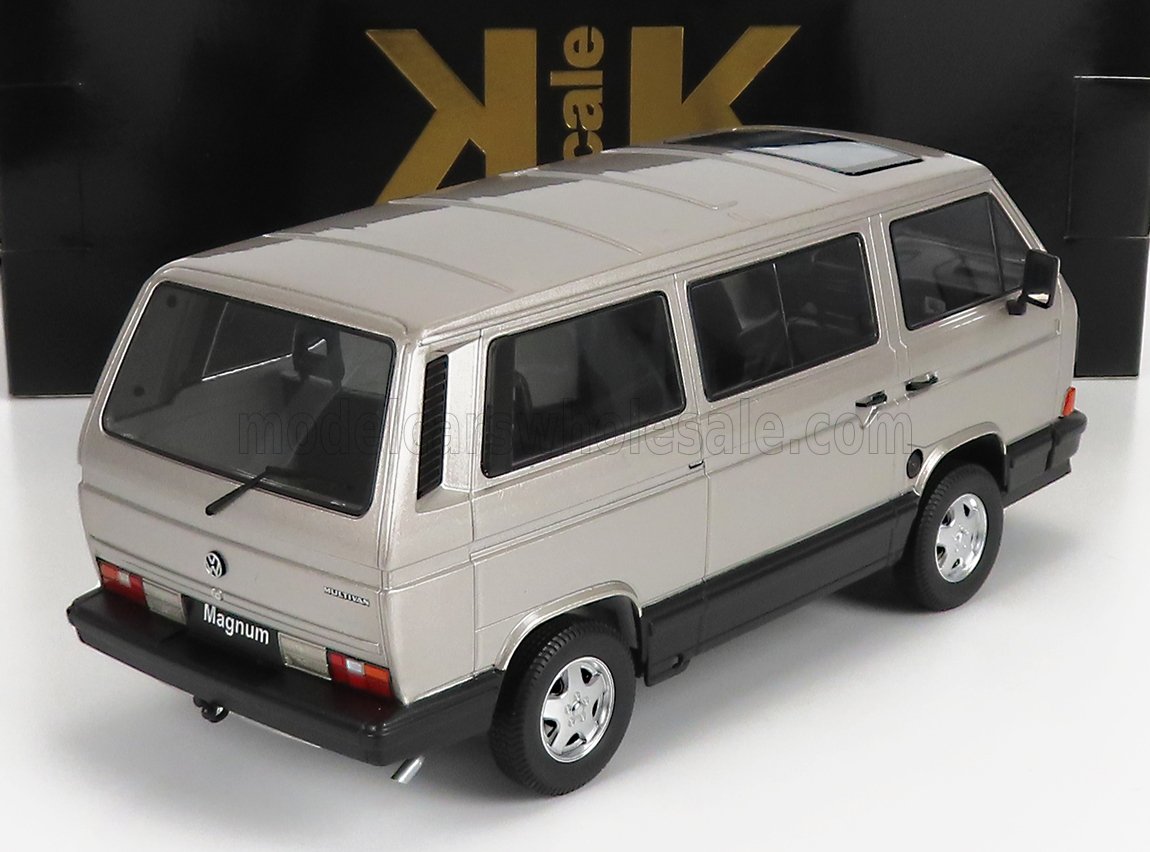 Silver Volkswagen Multivan model car with black trim, displayed with black and gold box, available on Vroomi