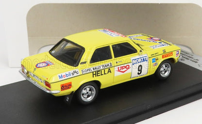 Yellow Opel rally car model with sponsor decals, number 9, displayed on black stand, offered on Vroomi