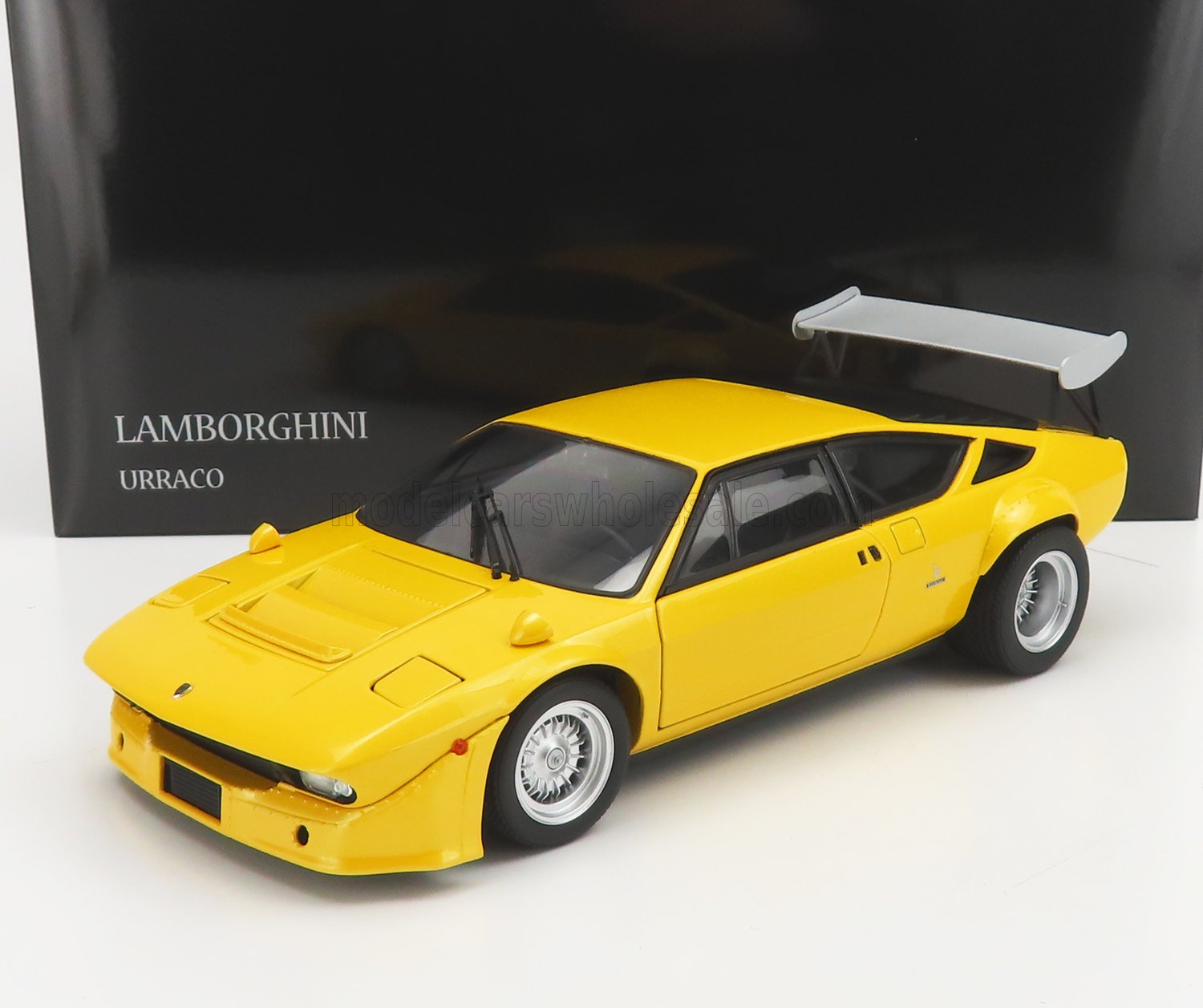 Yellow Lamborghini Urraco scale model car with rear wing, available now at Vroomi.