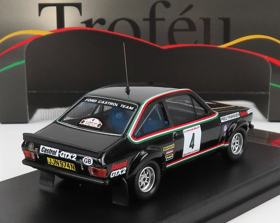 Black Ford Castrol Team GTX2 rally car model with racing decals on display, offered on Vroomi