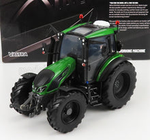 Detailed green Valtra tractor scale model with large wheels, displayed with branded box background, available at Vroomi