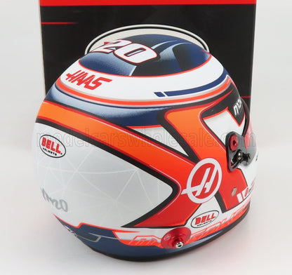 Scale model car helmet with Haas F1 livery, Bell branding, and Vroomi collector detail