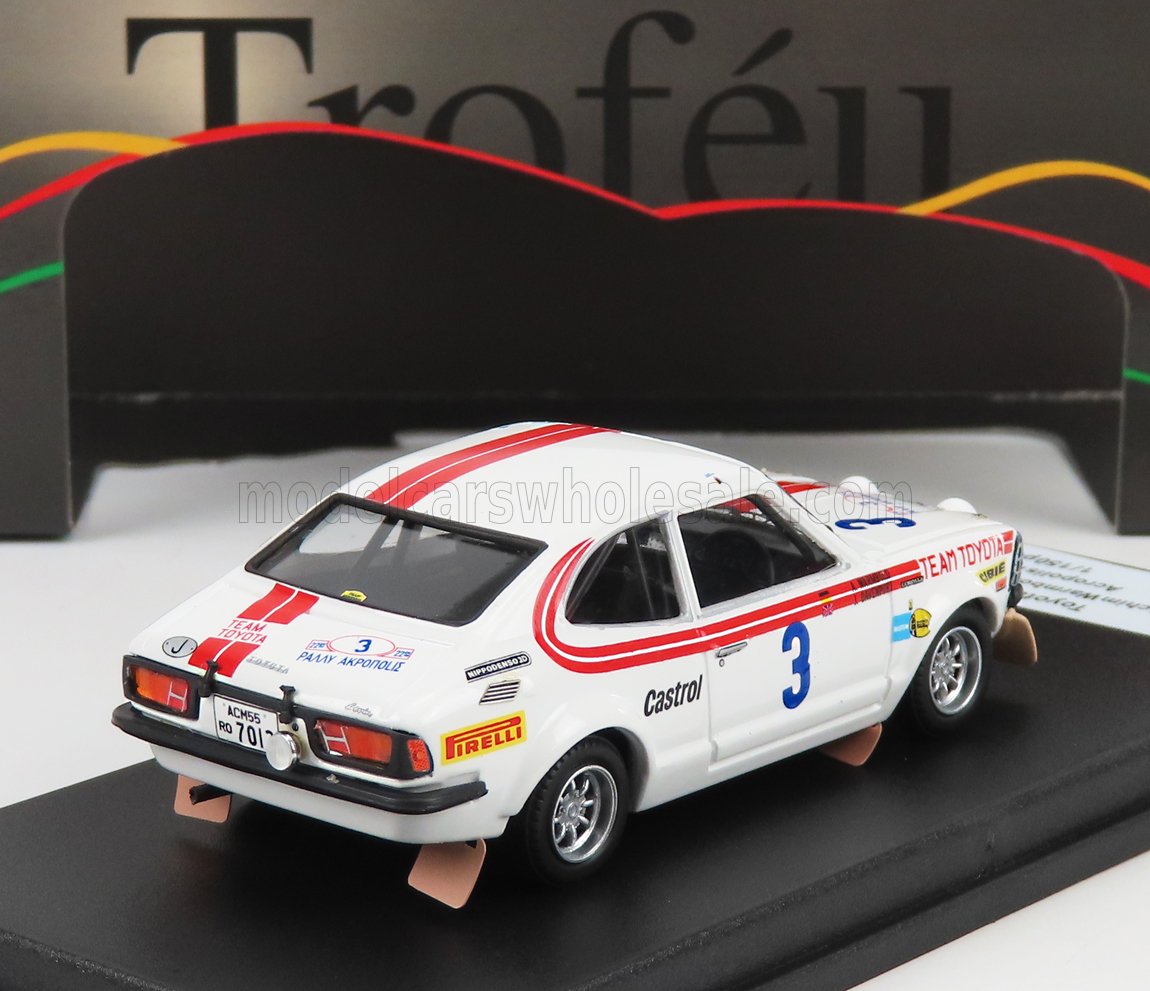 Voiture miniature Toyota Corolla Levin blanche avec bandes rouges, livrée Team Toyota et marquage Castrol, présentée chez Vroomi