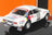 White Peugeot rally scale model car with Esso, Michelin decals, displayed at Vroomi