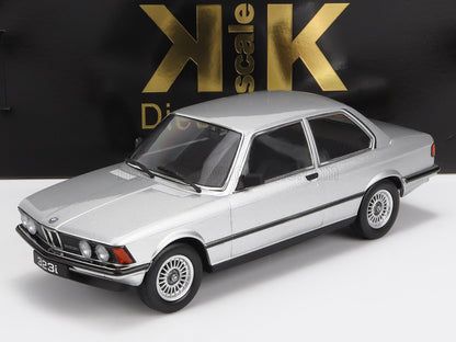 Silver BMW 323i 1/18 scale model car collectible, available now at Vroomi