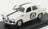 Voiture miniature blanche avec bandes de course noires et numéro 45, présentée sur socle noir chez Vroomi