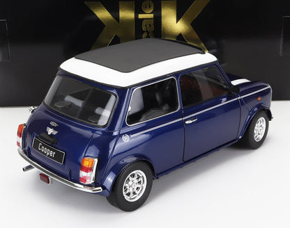 Blue classic Mini Cooper model car with white roof, detailed wheels, and chrome accents, available through Vroomi