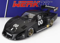 Modellino in scala Porsche 935 nero con #00, pneumatici Goodyear e livrea Interscope — Vroomi