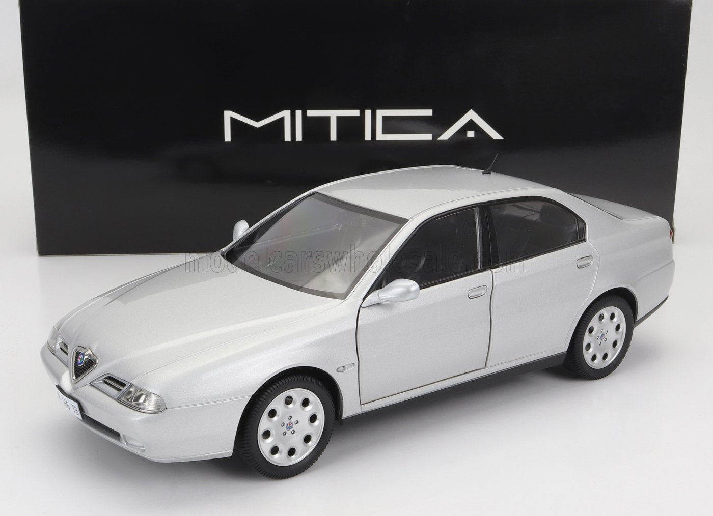 Silver Alfa Romeo 166 diecast model car front side view with MITICA branding, offered on Vroomi