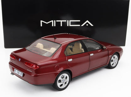 Red Alfa Romeo 3.0 V6 24v model car with tan interior displayed against MITICA box, available on Vroomi