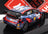 Voiture miniature Hyundai Rallye avec décalcomanies Shell et Mobis, présentée sur surface réfléchissante chez Vroomi