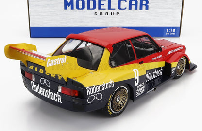 1:18 scale die-cast Porsche 944 race car model in yellow, red, and black with Rodenstock and Castrol logos, available at Vroomi